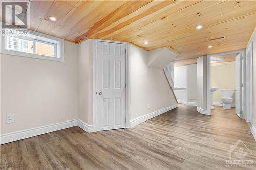 Recently renovated basement provides additional recreation or work space. Lovely wood ceiling with pot lights. - 11 Gilchrist Avenue, Ottawa, ON - Indoor Photo Showing Other Room