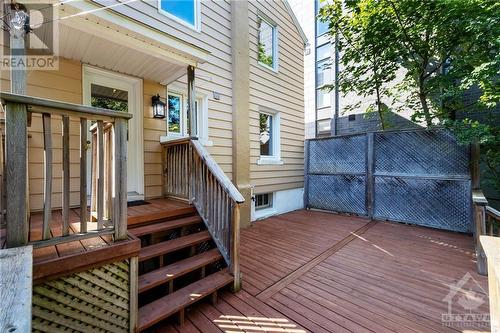 Sizeable deck is your perfect outdoor living space. Enjoy your morning coffee listening to the sounds of the birds chirping in the many surrounding trees. - 11 Gilchrist Avenue, Ottawa, ON - Outdoor With Exterior