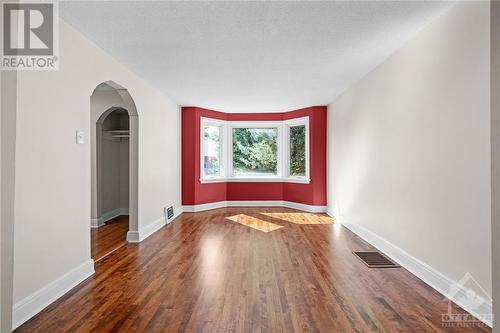 Bay window facing west allows tons of light to enter pricipal rooms. - 11 Gilchrist Avenue, Ottawa, ON - Indoor Photo Showing Other Room