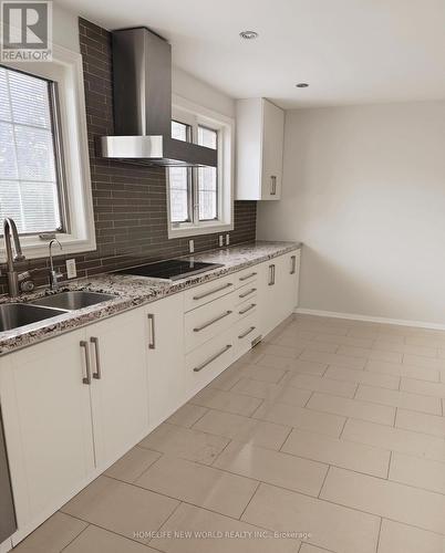 18 Olsen Drive, Toronto, ON - Indoor Photo Showing Kitchen With Double Sink