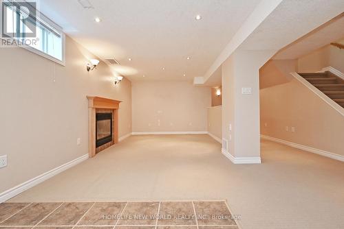 22 Carley Crescent, Barrie, ON - Indoor Photo Showing Other Room With Fireplace