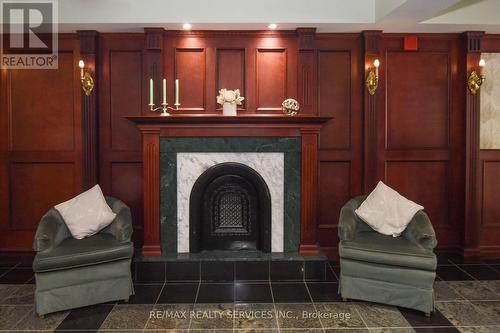 501 - 24 Chapel Street, Halton Hills, ON - Indoor Photo Showing Other Room With Fireplace