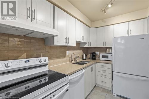 14 Derby Street Unit# 28, Hamilton, ON - Indoor Photo Showing Kitchen With Double Sink