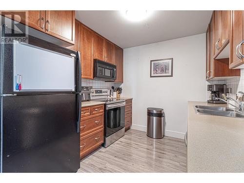 246 Hastings Avenue Unit# 302, Penticton, BC - Indoor Photo Showing Kitchen With Double Sink