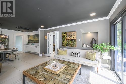 Heated floors in Dining Room & Sun Lounge - 824 Clearview Avenue, London, ON - Indoor Photo Showing Living Room