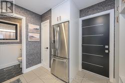 Extra fridge in mud room - 