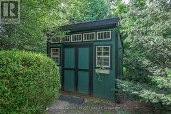 Custom shed with window boxes - 