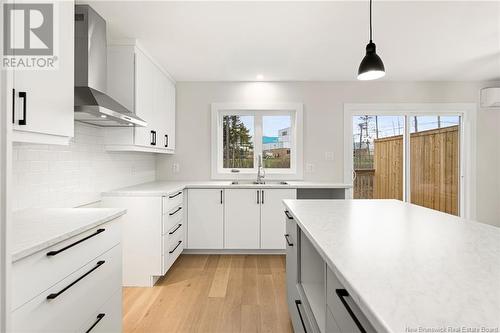 107 Elsliger Street, Dieppe, NB - Indoor Photo Showing Kitchen With Double Sink