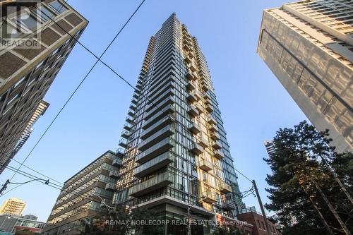 301 - 75 St Nicholas Street, Toronto, ON - Outdoor With Balcony With Facade