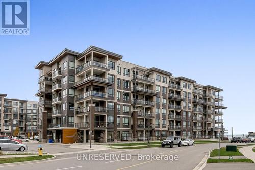 207 - 10 Esplanade Lane, Grimsby, ON - Outdoor With Facade