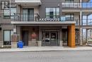 207 - 10 Esplanade Lane, Grimsby, ON  - Outdoor With Facade 