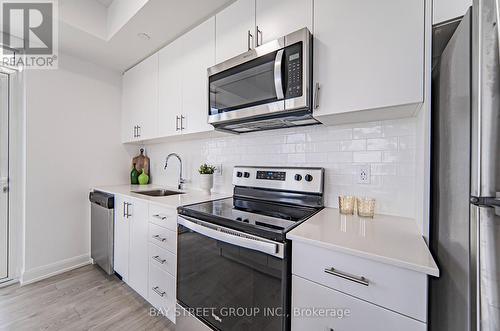 1101 - 3200 William Coltson Avenue, Oakville, ON - Indoor Photo Showing Kitchen With Stainless Steel Kitchen With Upgraded Kitchen