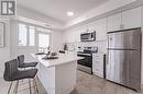 1101 - 3200 William Coltson Avenue, Oakville, ON  - Indoor Photo Showing Kitchen With Stainless Steel Kitchen 