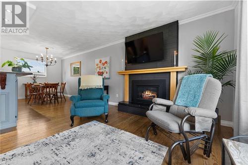 320 Patricia Avenue, Pembroke, ON - Indoor Photo Showing Living Room With Fireplace