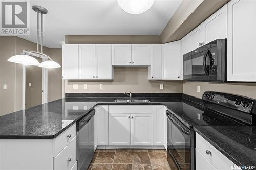 104 150 Pawlychenko Lane, Saskatoon, SK - Indoor Photo Showing Kitchen With Double Sink