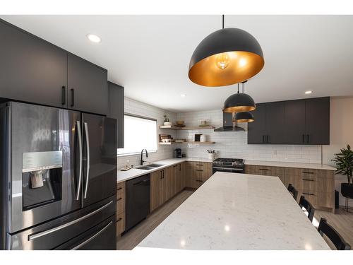 11 Mt Proctor Avenue, Fernie, BC - Indoor Photo Showing Kitchen With Double Sink With Upgraded Kitchen