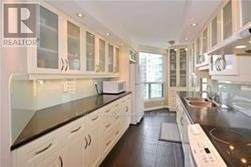 1605 - 30 Holly Street, Toronto, ON - Indoor Photo Showing Kitchen With Double Sink