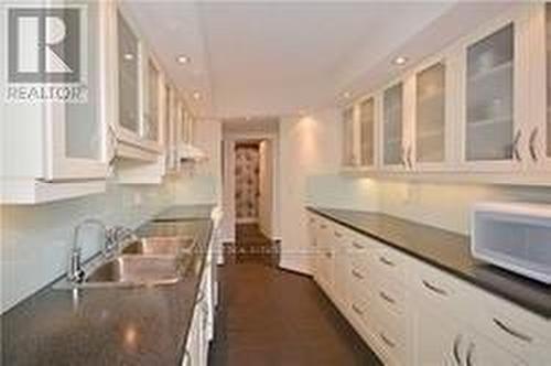 1605 - 30 Holly Street, Toronto, ON - Indoor Photo Showing Kitchen With Double Sink