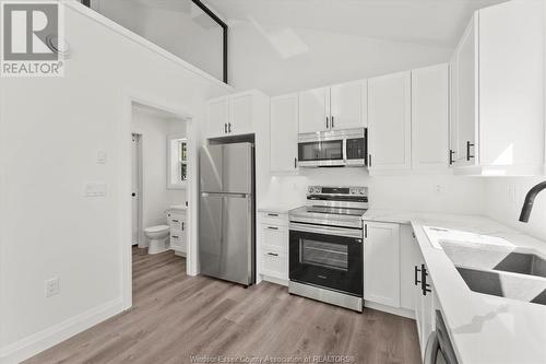 1310 Westcott Unit# Rear, Windsor, ON - Indoor Photo Showing Kitchen With Double Sink