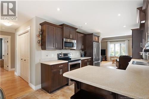 91 Larochelle, Dieppe, NB - Indoor Photo Showing Kitchen With Stainless Steel Kitchen With Double Sink