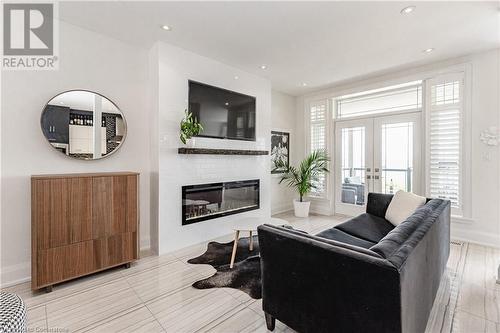 1083 Beach Boulevard, Hamilton, ON - Indoor Photo Showing Living Room With Fireplace