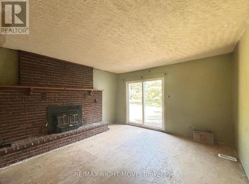 1581 Balkwill Line, Severn, ON - Indoor With Fireplace