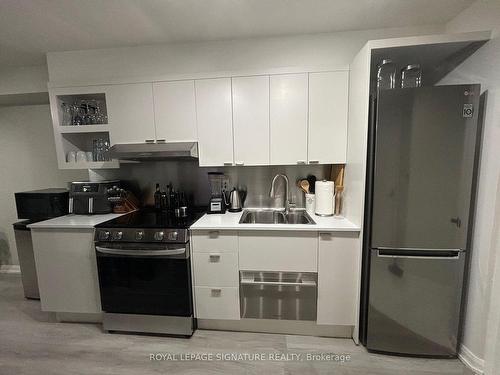 206-111 Elizabeth St, Toronto, ON - Indoor Photo Showing Kitchen With Double Sink