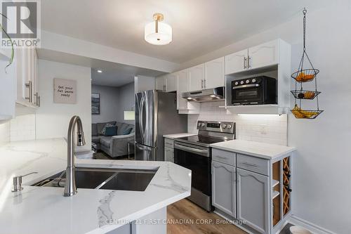 62 - 70 Chapman Court, London, ON - Indoor Photo Showing Kitchen With Double Sink