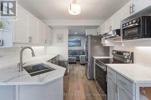 62 - 70 Chapman Court, London, ON - Indoor Photo Showing Kitchen With Double Sink