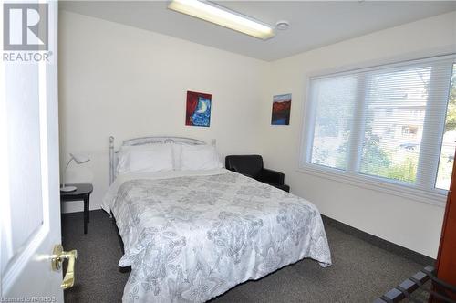 Carriage House Main Floor Bedroom 1 - 1000 1St Avenue W, Owen Sound, ON - Indoor Photo Showing Bedroom