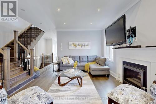 92 Holt Drive, New Tecumseth, ON - Indoor Photo Showing Living Room With Fireplace