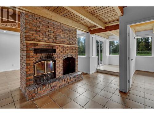 1729 Hoferkamp Road, Prince George, BC - Indoor Photo Showing Living Room With Fireplace