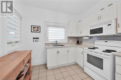 54 Barnesdale Avenue S, Hamilton, ON - Indoor Photo Showing Kitchen With Double Sink