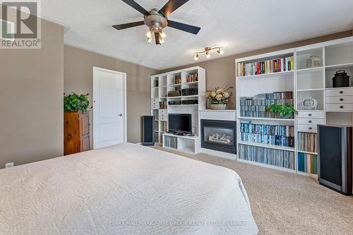 6 Redvers Street, Whitby (Williamsburg), ON - Indoor Photo Showing Bedroom With Fireplace