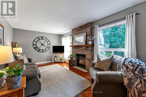 6 Redvers Street, Whitby (Williamsburg), ON - Indoor Photo Showing Living Room With Fireplace