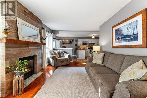 6 Redvers Street, Whitby (Williamsburg), ON - Indoor Photo Showing Living Room With Fireplace