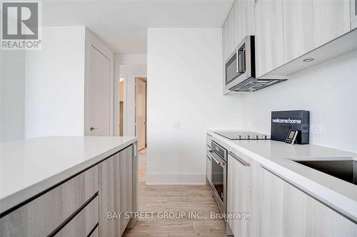 1022 - 118 Merchants' Wharf Avenue, Toronto, ON - Indoor Photo Showing Kitchen