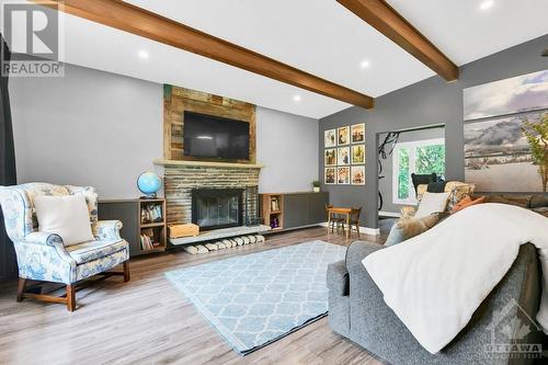 21 Ettrick Crescent, Ottawa, ON - Indoor Photo Showing Living Room With Fireplace