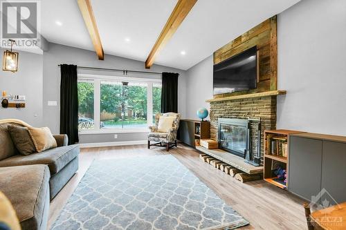 21 Ettrick Crescent, Ottawa, ON - Indoor Photo Showing Living Room With Fireplace