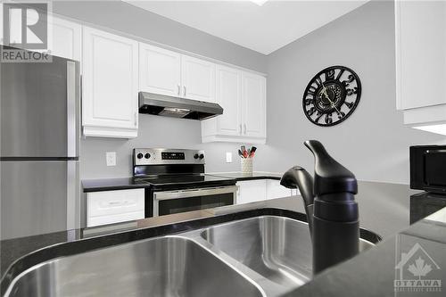 103 North Street Unit#403, Perth, ON - Indoor Photo Showing Kitchen With Double Sink