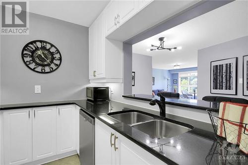 103 North Street Unit#403, Perth, ON - Indoor Photo Showing Kitchen With Double Sink