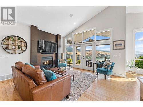 2707 Cliffshore Drive, Lake Country, BC - Indoor Photo Showing Other Room With Fireplace