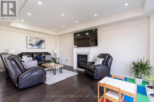 22 Wainwright Drive, Brampton, ON - Indoor Photo Showing Living Room With Fireplace