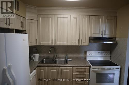 2704 - 380 Dixon Road, Toronto, ON - Indoor Photo Showing Kitchen With Double Sink