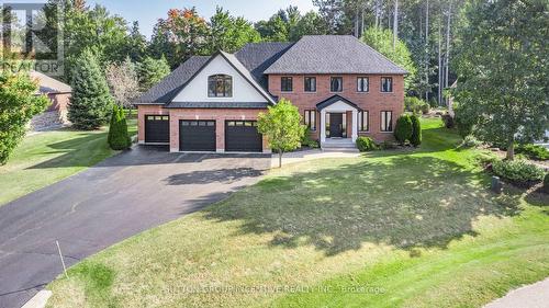 38 Lilac Lane, Springwater, ON - Outdoor With Facade