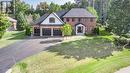 38 Lilac Lane, Springwater, ON  - Outdoor With Facade 