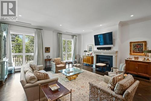 204 - 1 Post Road, Toronto, ON - Indoor Photo Showing Living Room With Fireplace