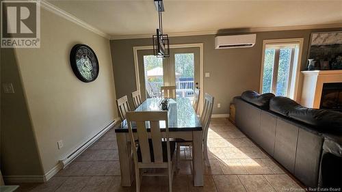 8 King Street, Saint-Léonard, NB - Indoor Photo Showing Dining Room With Fireplace