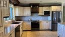 8 King Street, Saint-Léonard, NB  - Indoor Photo Showing Kitchen With Double Sink 