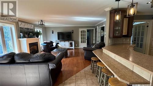 8 King Street, Saint-Léonard, NB - Indoor Photo Showing Living Room With Fireplace